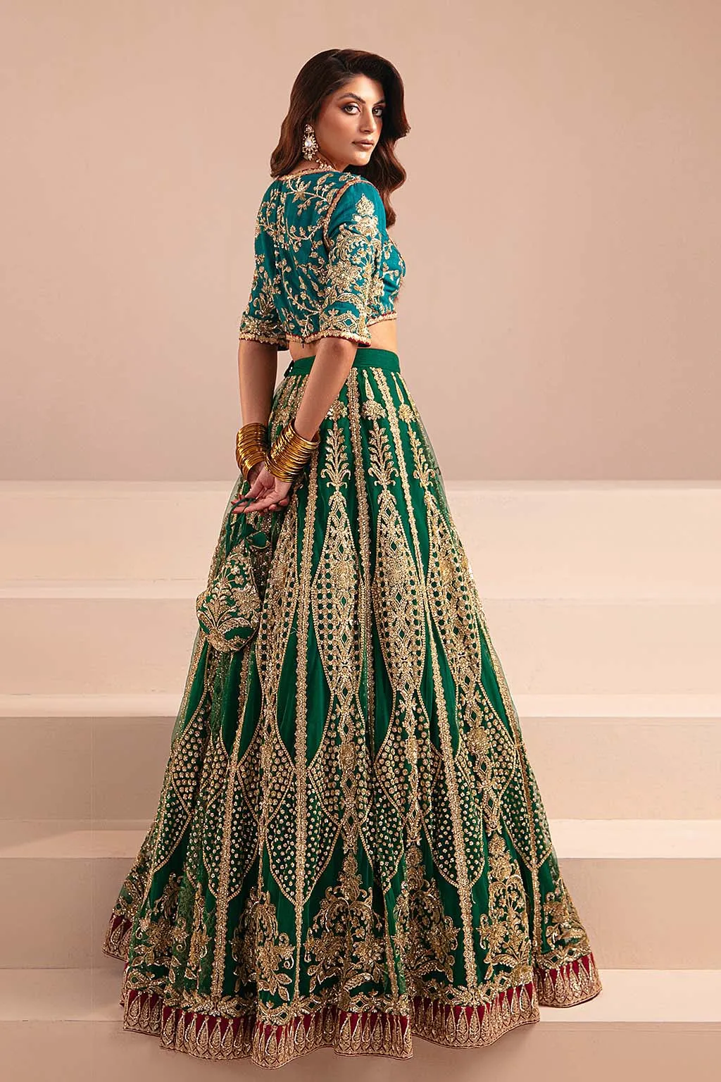 Classic Pakistani Wedding Dress with Green Lehenga Choli and Blue Contrast