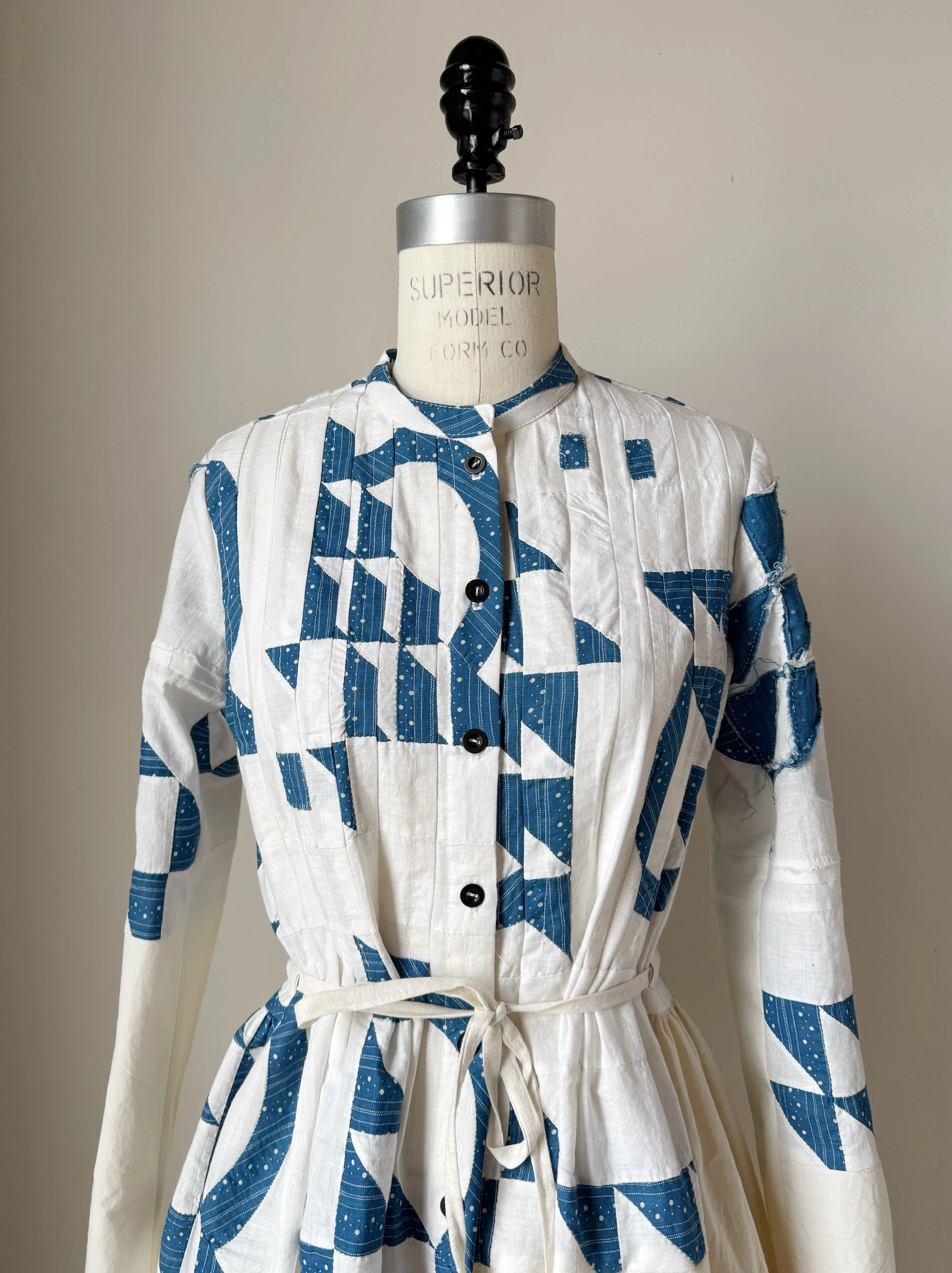 pleated and patched bodice work dress with antique quilt